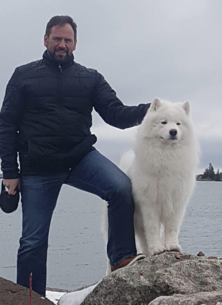 Judge Joe Deleo with his Samoyed dog
